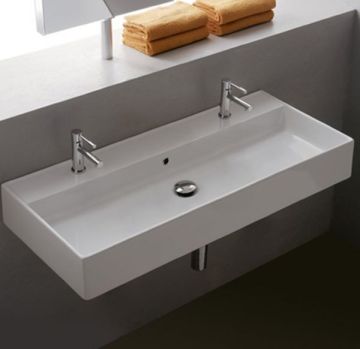 Lavabo sospeso con doppia rubinetteria monoforo della collezione Theorema di Scarabeo-120 x 46